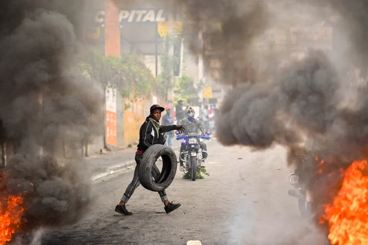 AFP__20240312__34LE9GP__v1__HighRes__FilesHaitiPoliticsResign-728x485