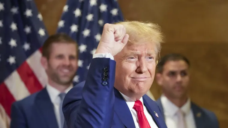 eric-trump-left-smiles-former-president-donald-trump-thanks-supporters-who-were-cheering-him-after-news-conference-thursday-jan-11-2024-new-york_98