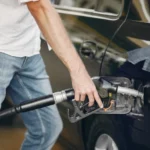 handsome-man-pours-gasoline-into-tank-car-728x485