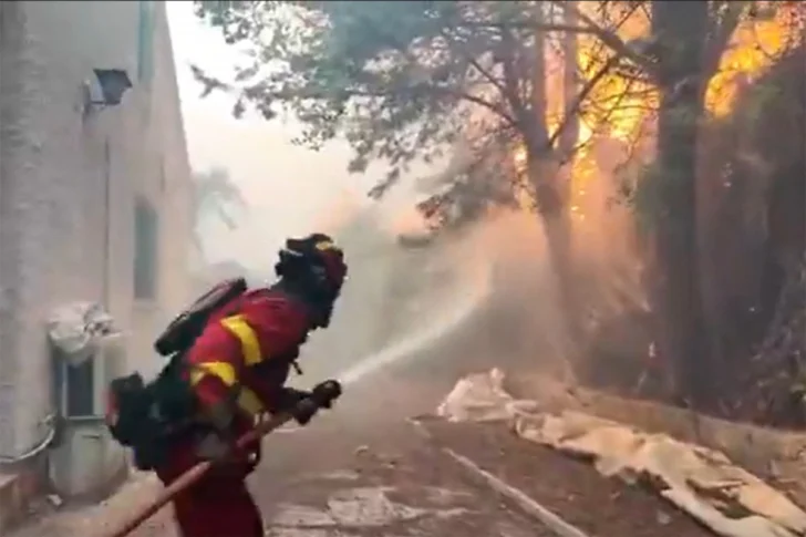 AFP__20260723__C3299CQ__v1__MidRes__SpainWildfireEmergencyClimate-728x485